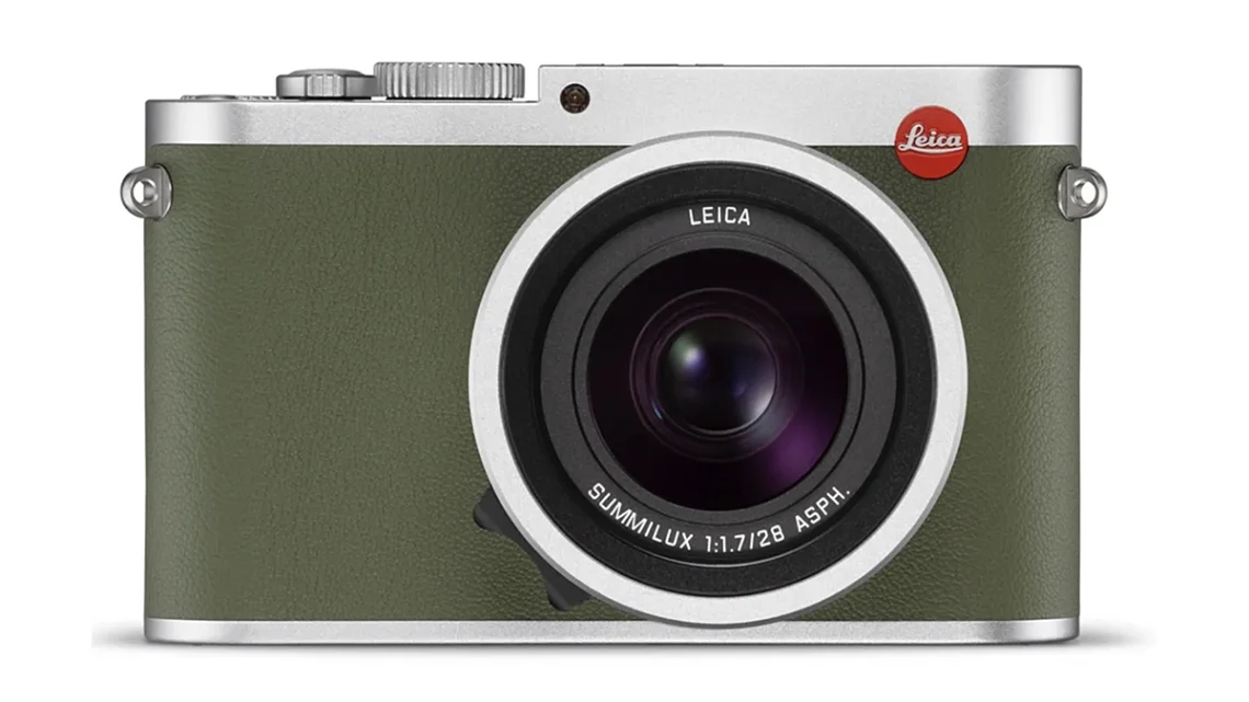 Leica Q in khaki with silver chrome top and bottom covers.