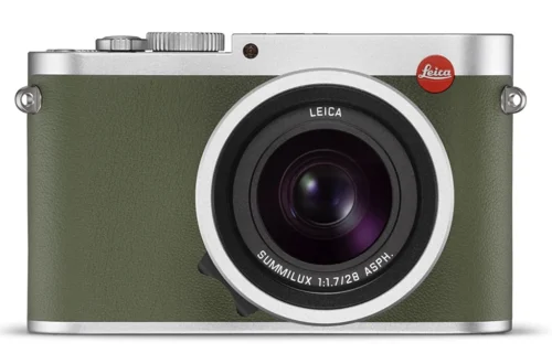 Leica Q in khaki with silver chrome top and bottom covers.