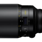 Noct Nikkor on a white background.