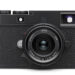 This is photo of the as yet unannounced Leica M11-P in black sporting the new 28mm F2 Summicron close focus lens.