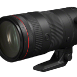 Big Canon pro zoom lens on a whire baackground