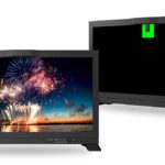 Expensive reference monitors on a white background.