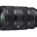 Sigma 28-45mm F1.8 zoom on white background.