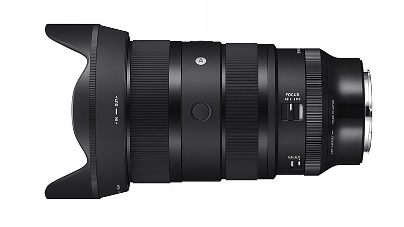 Sigma 28-45mm F1.8 zoom with hood on a white background.
