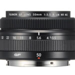 Fujifilm GF 50mm F3.5 lens on a white background without caps.
