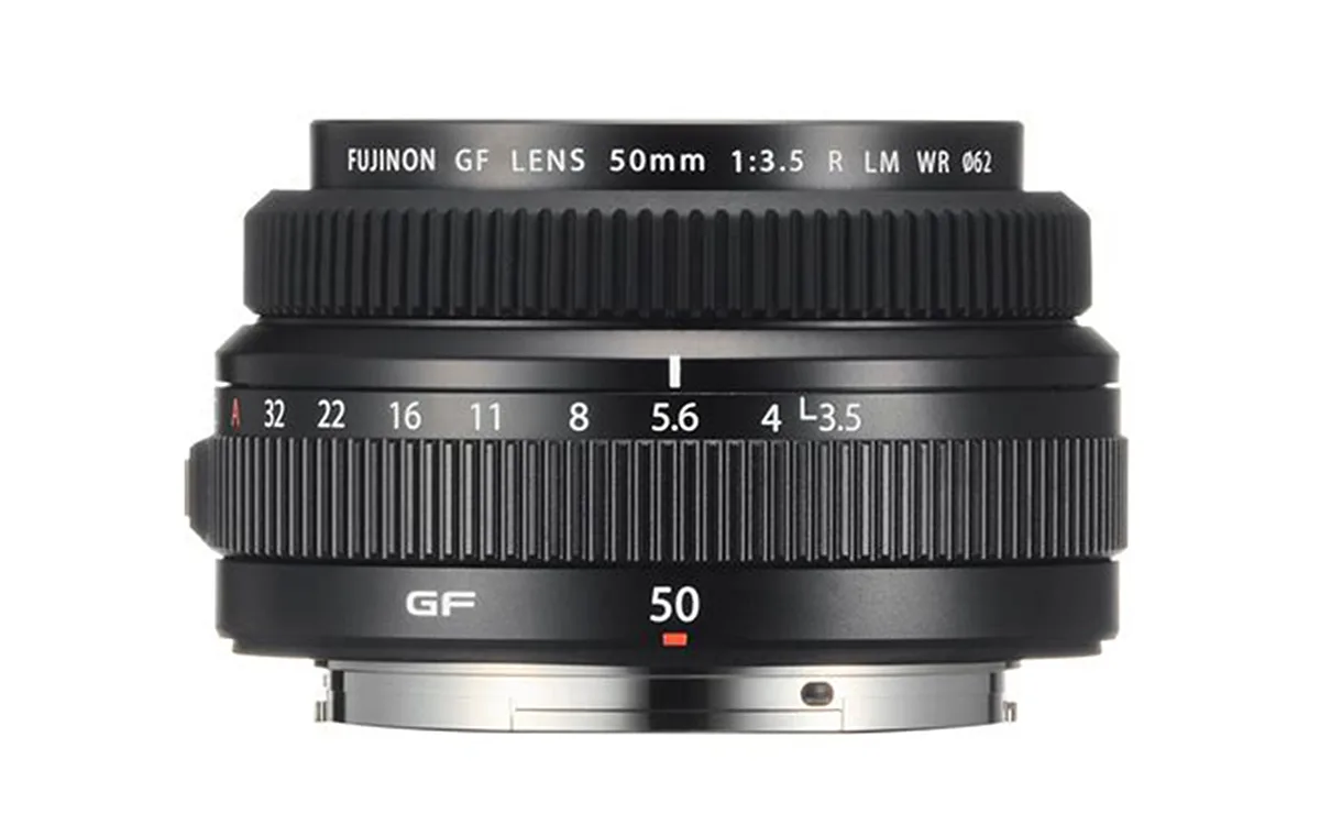 Fujifilm GF 50mm F3.5 lens on a white background without caps.