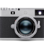 New old lens on a new M11-P camera on a white background