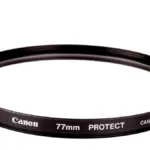 Glass 'Protector' filter made by Canon on a white background.