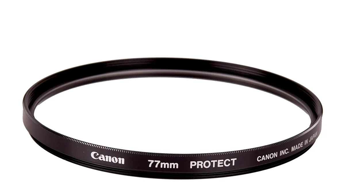 Glass 'Protector' filter made by Canon on a white background.