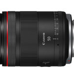 Black Canon lens on a white background