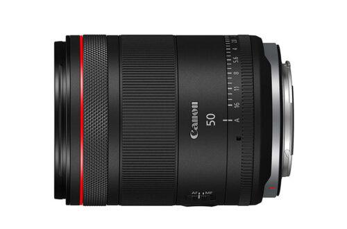 Black Canon lens on a white background