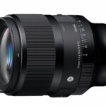 Sigma 35mm lens on a white background.