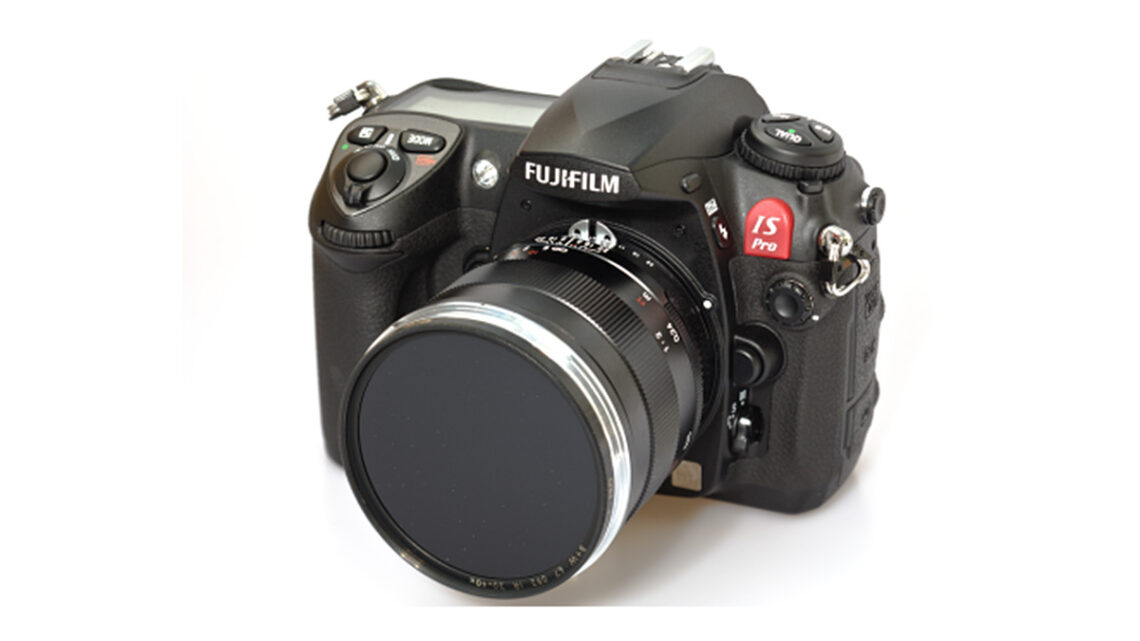 DSLR camera and lens on a white background