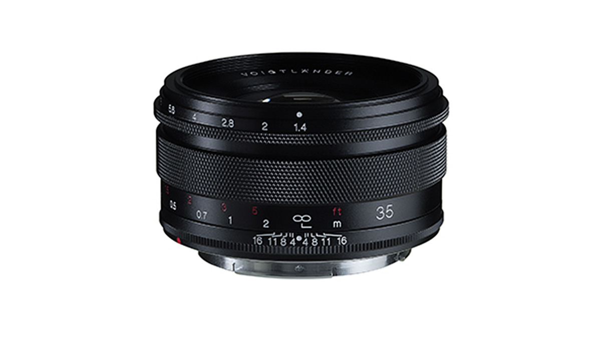 Voigtländer 35mm F1.4 RF lens on a white background