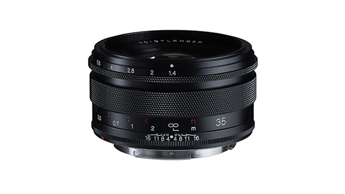 Voigtländer 35mm F1.4 RF lens on a white background